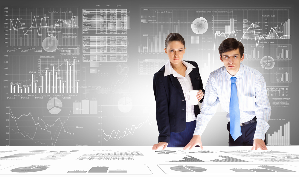 Businessman and businesswoman analyzing data information of market